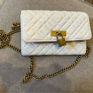 Kurt Geiger wallet on a chain crossbody